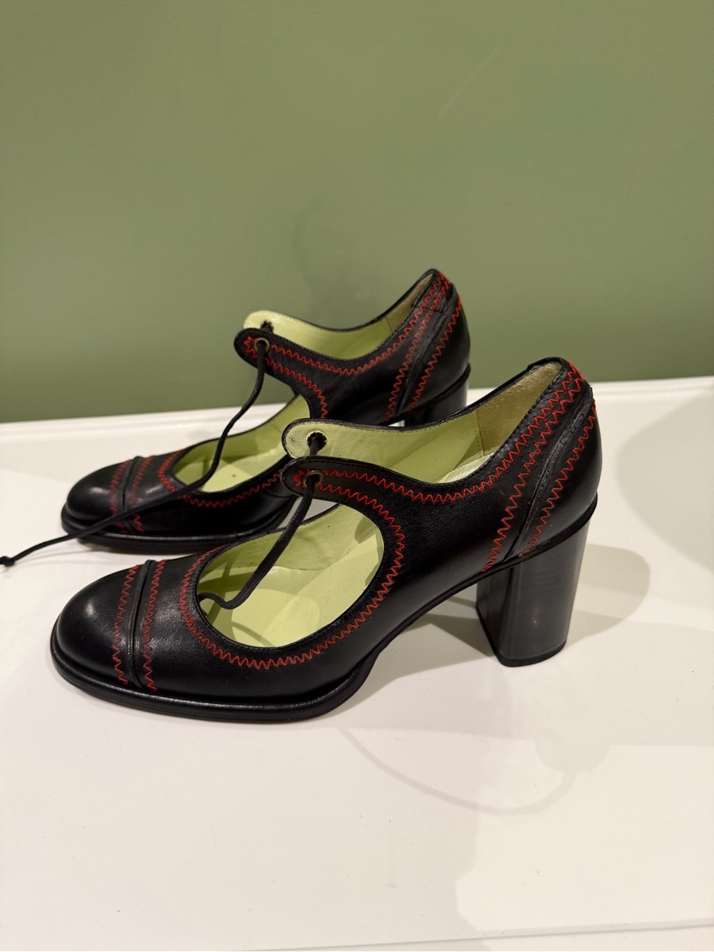 COCLICO Black Leather Mary Jane heels with Red Stitching